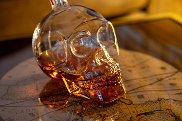 Skull and booze liquor on a table