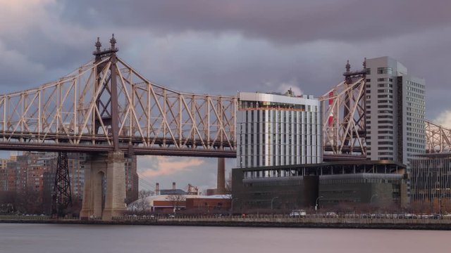 Day to night time-lapse with full moonrise over Queensboro Bridge