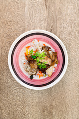 Asian style caramel pork with rice and vegetable