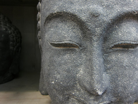 part of a meditating buddha statue