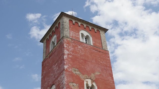 Beautiful details of architecture on Zica monastery bell tower 4K tilting video