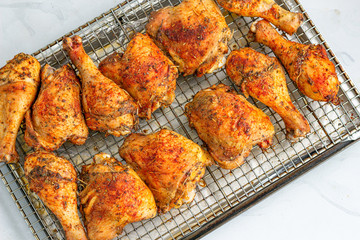 Roasted Chicken with Herbs on a Grilling Tray Top View Photo, Roast Chicken Stock Photo.