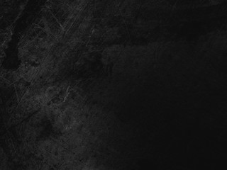 Black grunge texture with scratches.