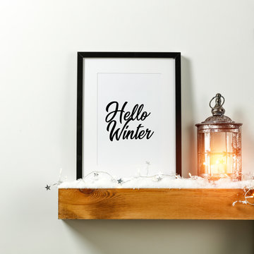 Winter background of frame with free space for your decoration.Wooden shelf on wall and copy space 
