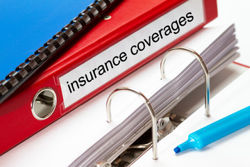 large red folder for insurance coverages including blue ring binder and blue marker