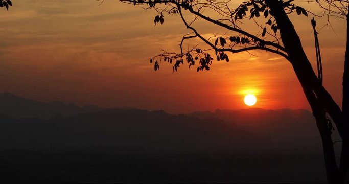 Timelapse of a beautiful sunset over the mountain.
