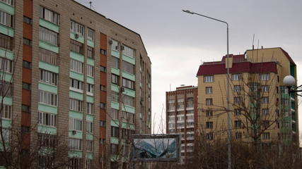 Grunge cityscape. Ust-Kamenogorsk (Kazakhstan). Contemporary architecture.