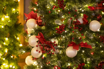 Christmas tree background - baubles and branch of spruce tree