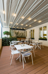 Hotel restaurant terrace interior with heater