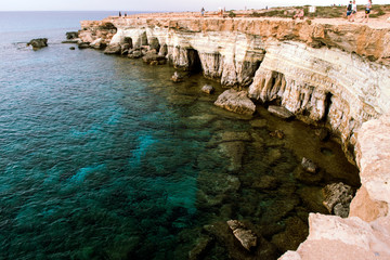 Fototapeta na wymiar Sea caves on the coast of Cape Kavo Greco in Cyprus.