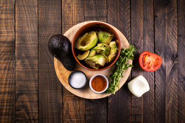 Ingredients prepared to make fresh, natural and homemade guacamole. Healthy and vegetarian food