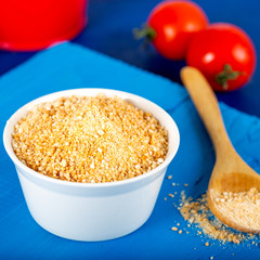 Turkish traditional tarhana (uncooked) on wooden background