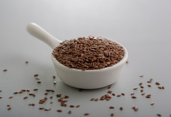 flax seeds in a small cup