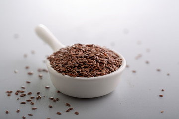 flax seeds in a small cup