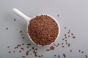flax seeds in a small cup