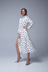 Pretty beautiful sexy elegance woman skin tan body fashion model glamor pose wear trend dress...