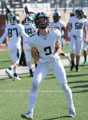 Football player in action during a game in South Texas