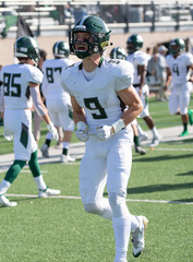 Football player in action during a game in South Texas