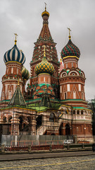 Fototapeta na wymiar The tower of the Moscow Kremlin against the gray sky.
