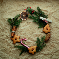 Traditional winter garland  on evergreen green branches.