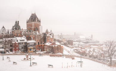 Cityscape of old Town of Quebec, Canada, in winter time. Can see the Chateau Frontenac with snow