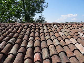 Roof in the foreground with brick tiles