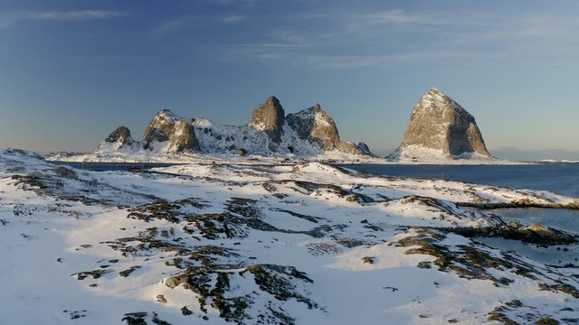 Winter in Tr&aelig;na islands and iconic Sanna mountains, Nordland, Northern Norway, aerial drone shot