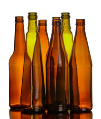 Empty glass bottles that can be used for different drinks.