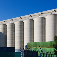 Grain Silos Against Blue Sky