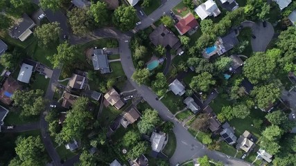 Iconic 4K aerial of a typical American suburbs neighborhood in summer
