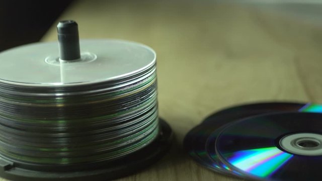 Stack Of Compact Discs On A Table