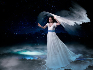 Mystical story with a girl in the clouds above the ground