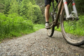 Fototapeta na wymiar Cyclist On Countryside Track