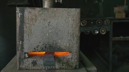 Forge workshop. Smithy manual production. Gas furnace for heating metal. Modern melting stove for...