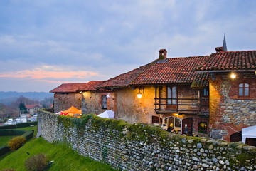 Candelo, Piedmont, Italy - December 14, 2019: Christmas markets inside the Ricetto, an ancient medieval defensive structure among the best preserved in Europe