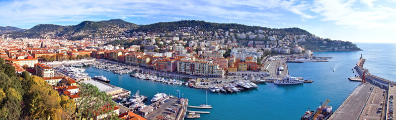 Naklejka na ściany i meble Nice, France - December 1, 2019: Panoramic aerial view over the Lympia port of Nice, France, on a clear winter morning, with Mount Boron hill on background