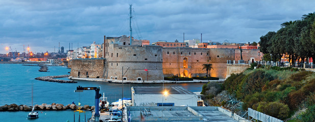 View of the Aragonese castle of Taranto, the old city and the industrial port, from the waterfront...