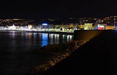 Fototapeta na wymiar Nice, France - December 2, 2019: night panoramic view on the Promenade Des Anglais, famous luxury waterfront on the Mediterranean Sea