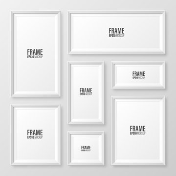 Realistic blank white picture frame with shadow collection isolated on gray background. Modern poster mockup. Empty photo frame for art gallery or interior. Vector illustration.