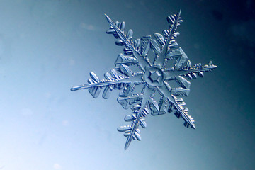 snowflake on black background