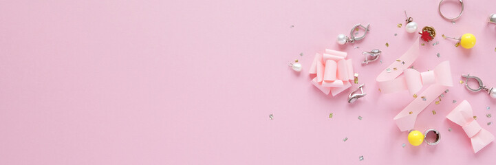 Female accessories on pink background. Female concept