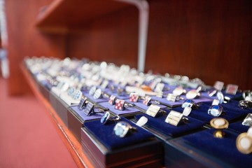 Set of hand cufflinks on display
