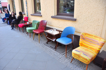 Colorful Retro Chairs Outside Urban Café