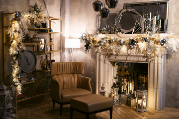 A beautiful living room with fireplace decorated for Christmas and Happy New Year