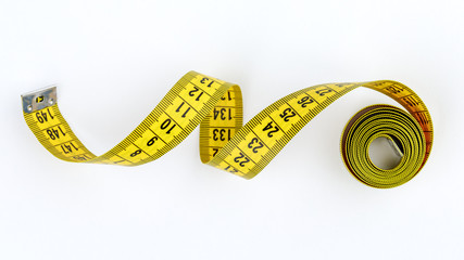 isolated measuring tape in yellow.