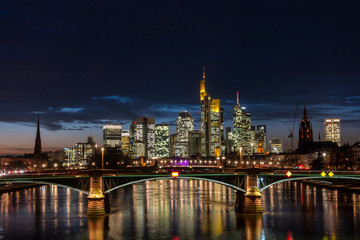 Naklejka na ściany i meble Panorama of the skyline Frankfurt am Main at twilight