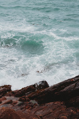 waves crashing on rocks