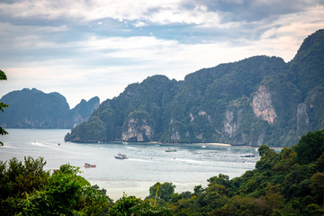 Speedboats and traditionals boats sailing in Andaman Sea as seen from viewpoint in Phi Phi Islands...