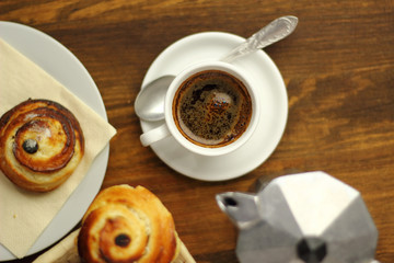Coffee Cup and Bread Roll. Continental Breakfast.