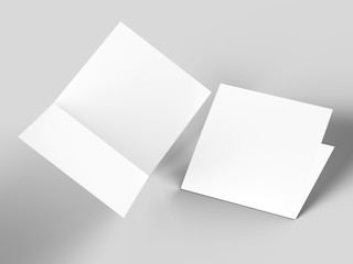 Brochure in square format folded to two - mockup. 3d illustration